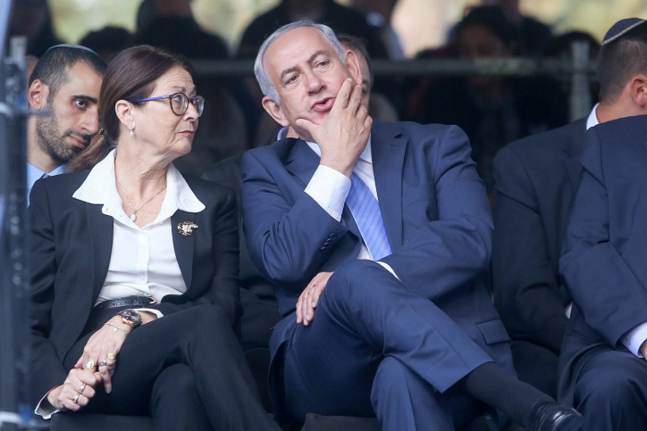 Israeli Prime Minister Benjamin Netanyahu with Supreme Court Chief Judge Esther Hayut during a memorial service marking 22 years since the assassination of Israeli Prime Minister Yitzhak Rabin, held at Mount Herzl cemetery in Jerusalem on Nov. 1, 2017.