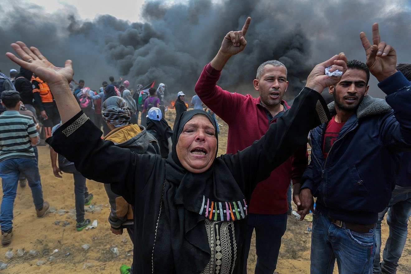 Palestinian protesters during clashes with Israeli forces near the Gaza-Israel border in Rafah, Gaza, on May 14, 2018. Photo by Abed Rahim Khatib/Flash90.