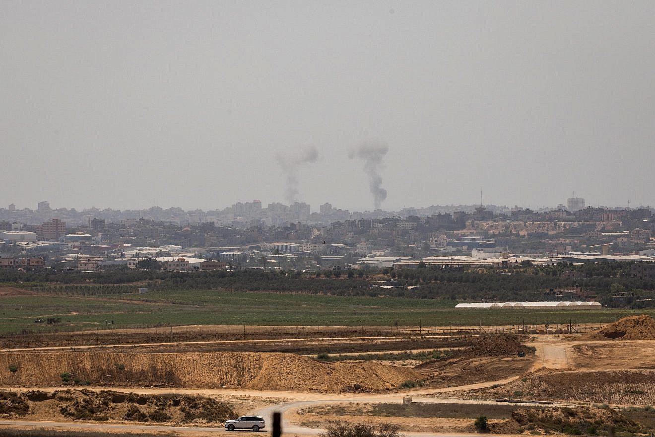 Smoke rises following an Israeli attack on the Gaza Strip as it seen from the Israeli side of the border on May 29, 2018. Photo by Yonatan Sindel/Flash90.