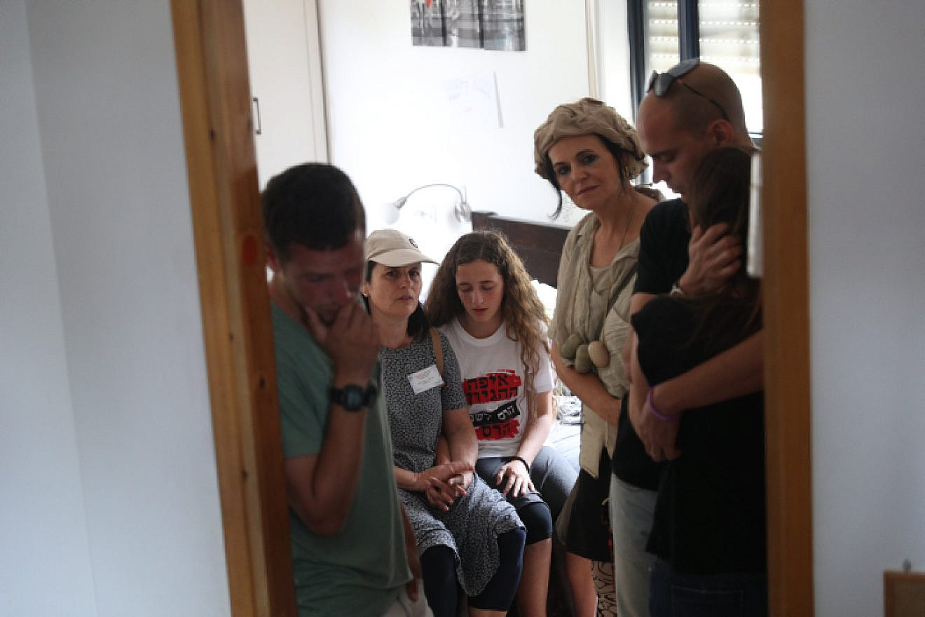 Israeli authorities evacuate people from a home in Netiv Ha’avot on June 12, 2018. Photo by Yonatan Sindel/Flash90.