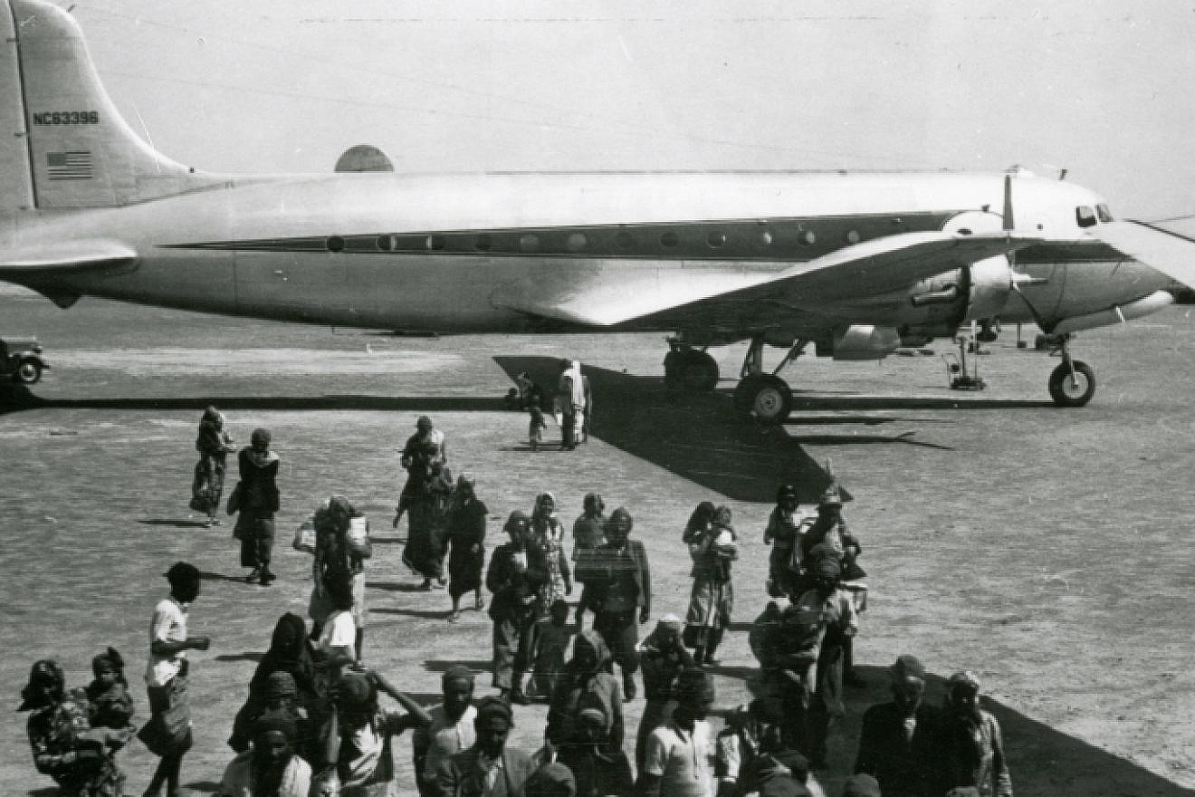 A group of Yemenite Jews prepare to board an Alaska Airlines aircraft in Aden, Yemen. The plane took them to safety in Israel. Credit: Alaska Airlines.