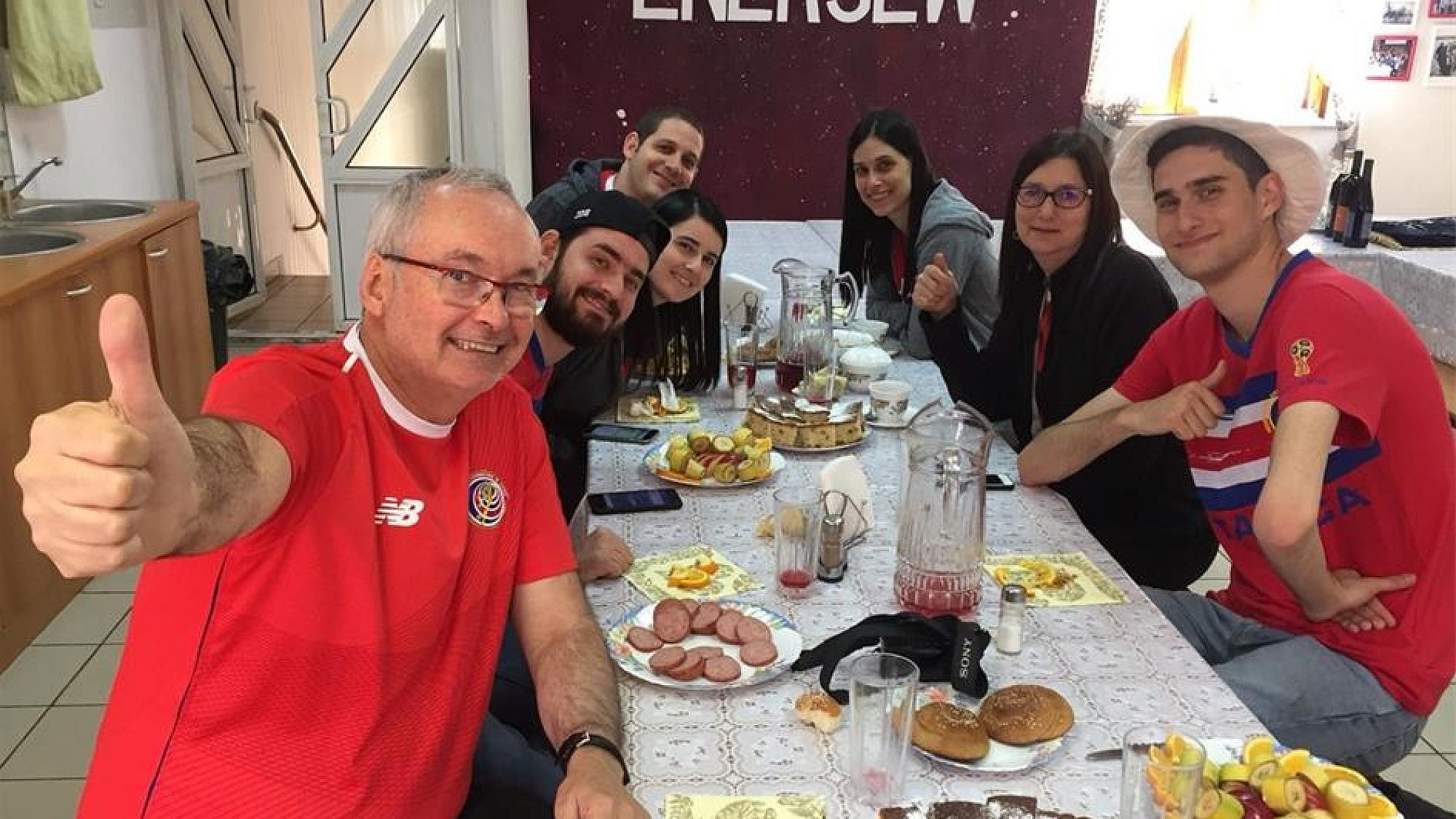 Soccer fans enjoy a kosher meal at the Chabad Jewish community center in Samara, Russia. (Credit: Chabad.org/News)