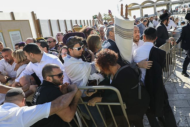 Members of the Reform movement and Hebrew Union College confront police and security guards while trying to enter a mixed men and women prayer area at the public square in front of the Western Wall in Jerusalem's Old City on Nov. 16, 2017.