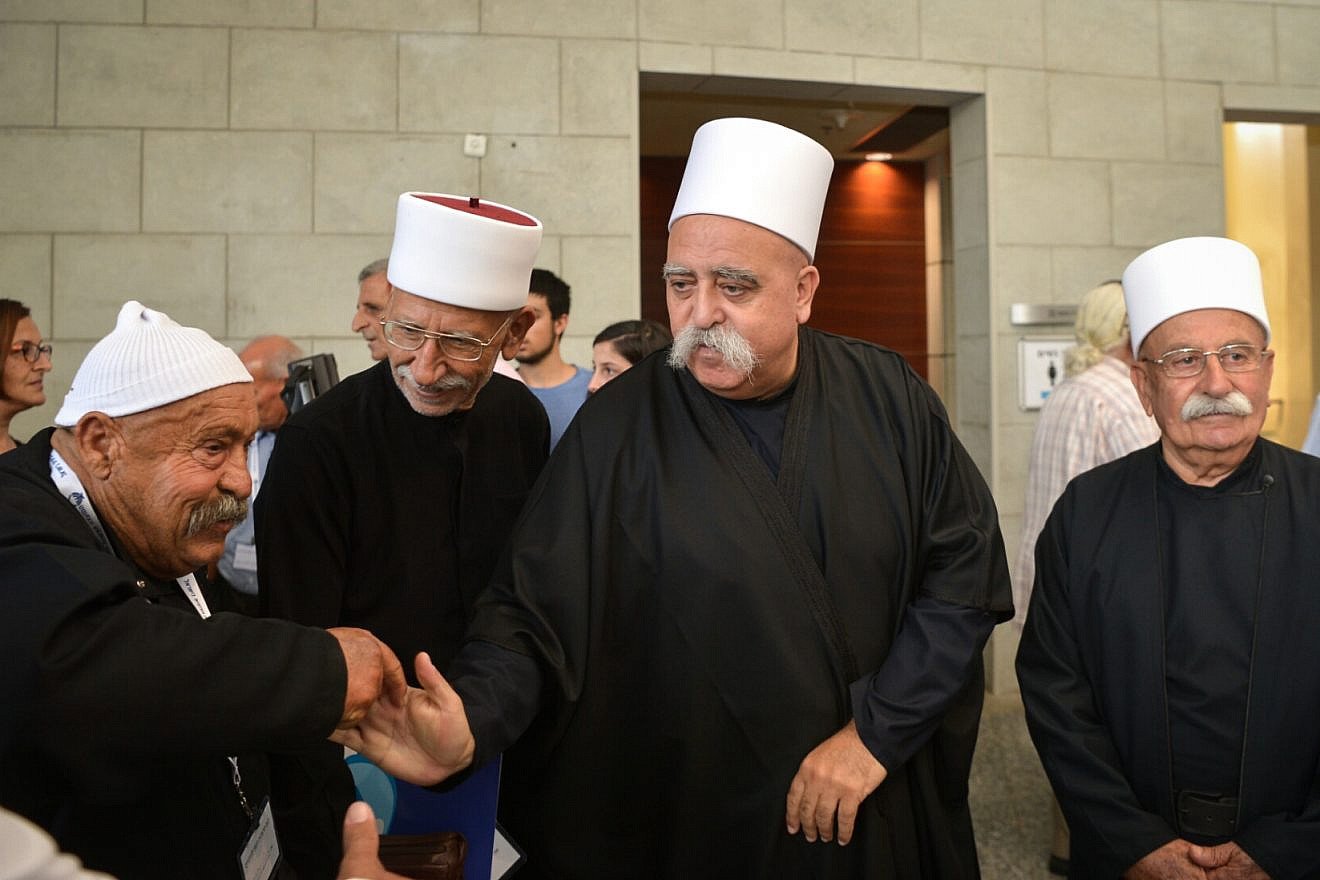 Shaykh Muwaffak Tarif (center), spiritual leader of the Israeli Druze community, attends a conference of the Zionist Druze Movement in Herzliya on July 16, 2018. Photo by Flash90.
