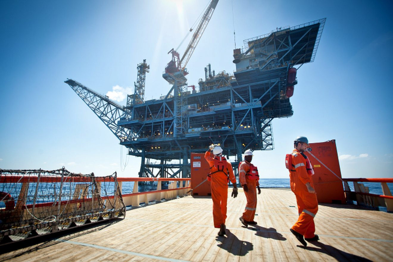 Workers on the Israeli Tamar gas-processing rig some 15 miles off the Israeli southern coast of Ashkelon. Noble Energy and Delek are the main partners in the gas field, June 23, 2014. Photo by Moshe Shai/Flash90.