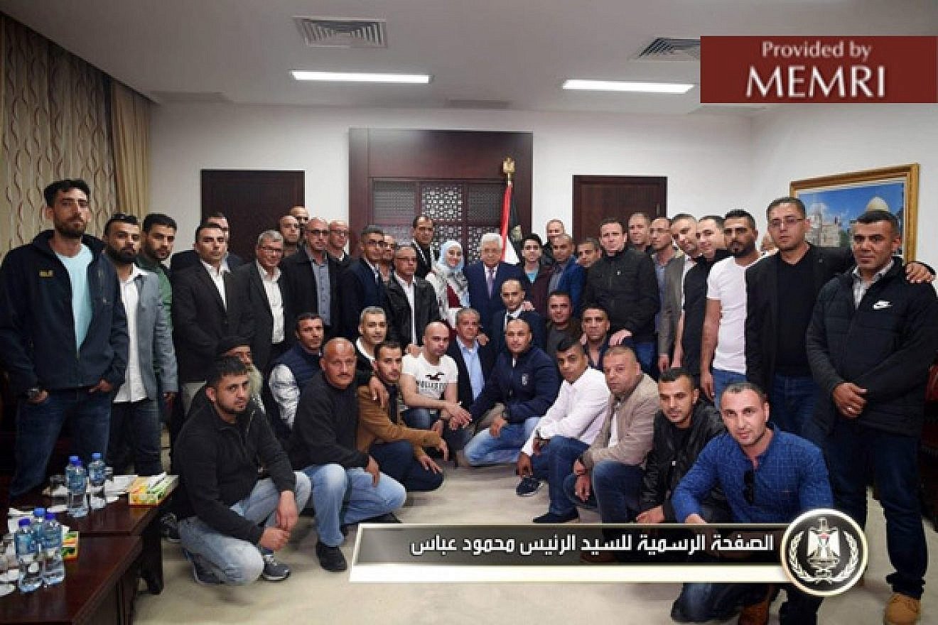 Palestinian Authority leader Mahmoud Abbas, center, meets with released prisoners who served 15-year sentences in Israeli prisons. Image: Facebook.com/President.Mahmoud.Abbas, April 22, 2018. (MEMRI)