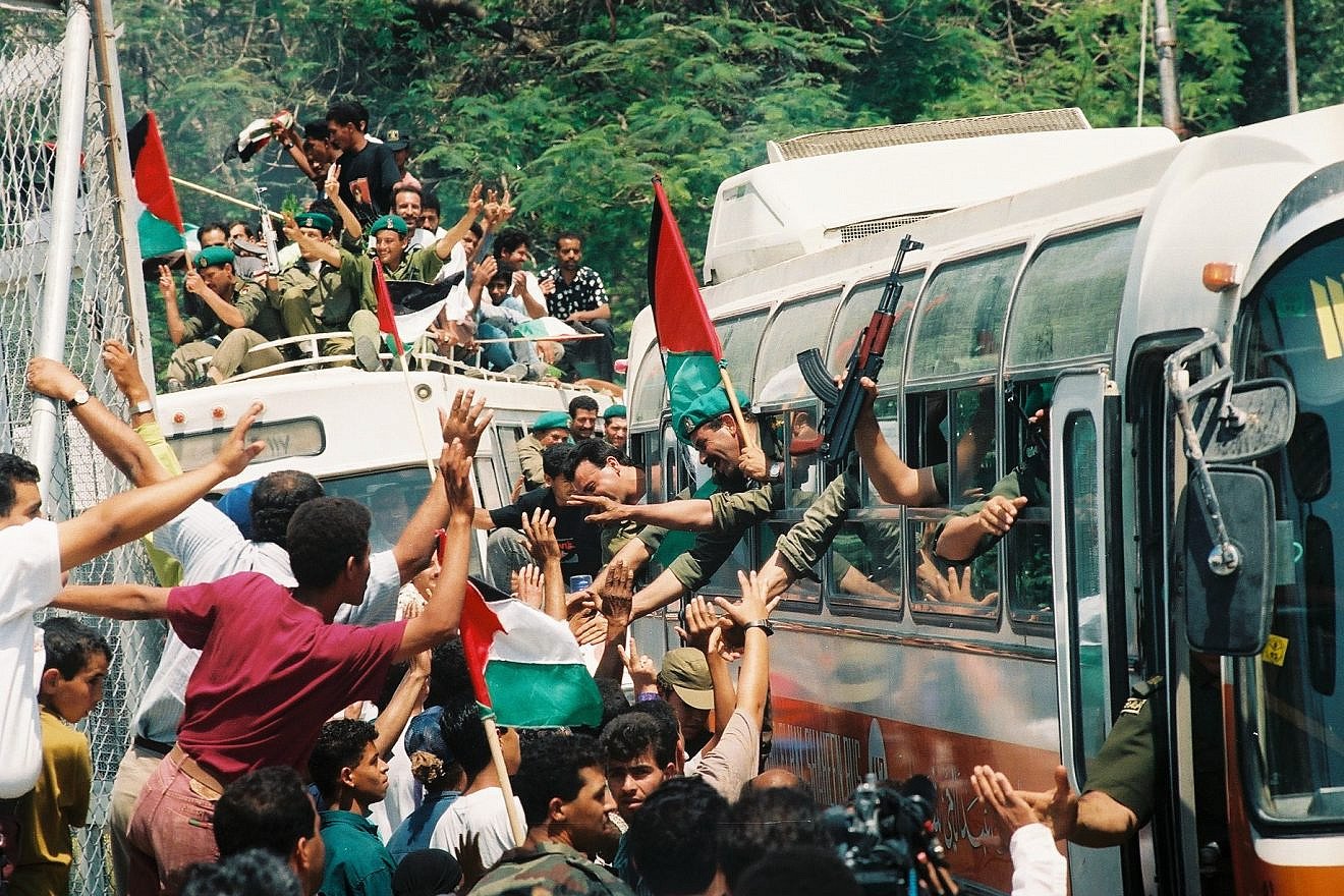 Palestinian policemen are celebrating on their entrance to the city of Jericho.Friday May 13 1994.  It was one of the first cities handed over to Palestinian Authority control in 1994, in accordance with the Oslo accords. CredIt: Yossi Zamir/Flash 90