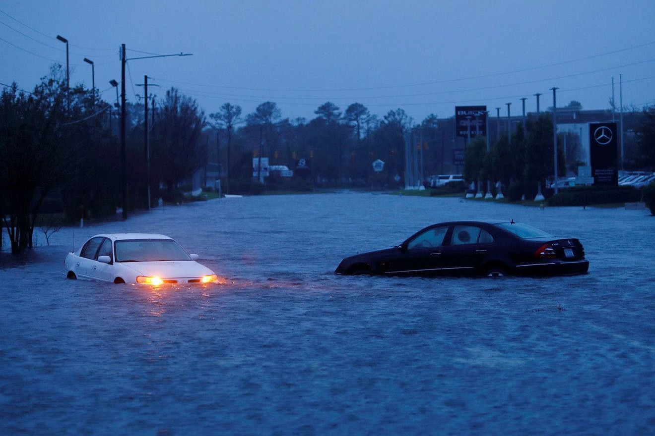 The torrential downpours and storm surges generated by Hurricane Florence have turned roads into rivers and made passage nearly impossible. Credit: Wiki Blog.