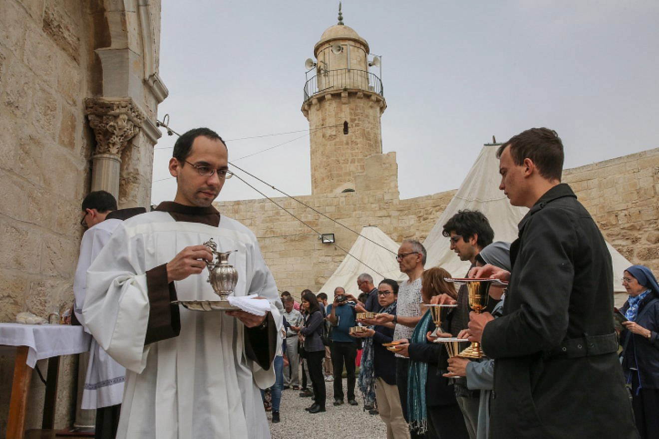 Worshippers visit the Chapel (and Mosque) of the Ascension, a Christian and Muslim shrine located on the Mount of Olives, during the Ascension holiday, on May 10, 2018. Photo by Yossi Zamir/Flash90