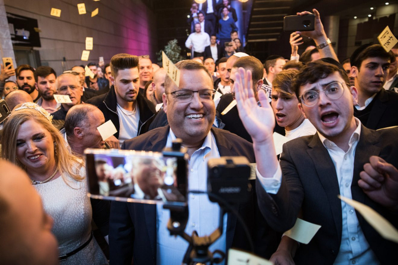 Supporters celebrate as Jerusalem mayoral candidate Moshe Lion arrives at his campaign headquarters as he leads the early counting in the municipal elections for Jerusalem on Oct. 30, 2018.