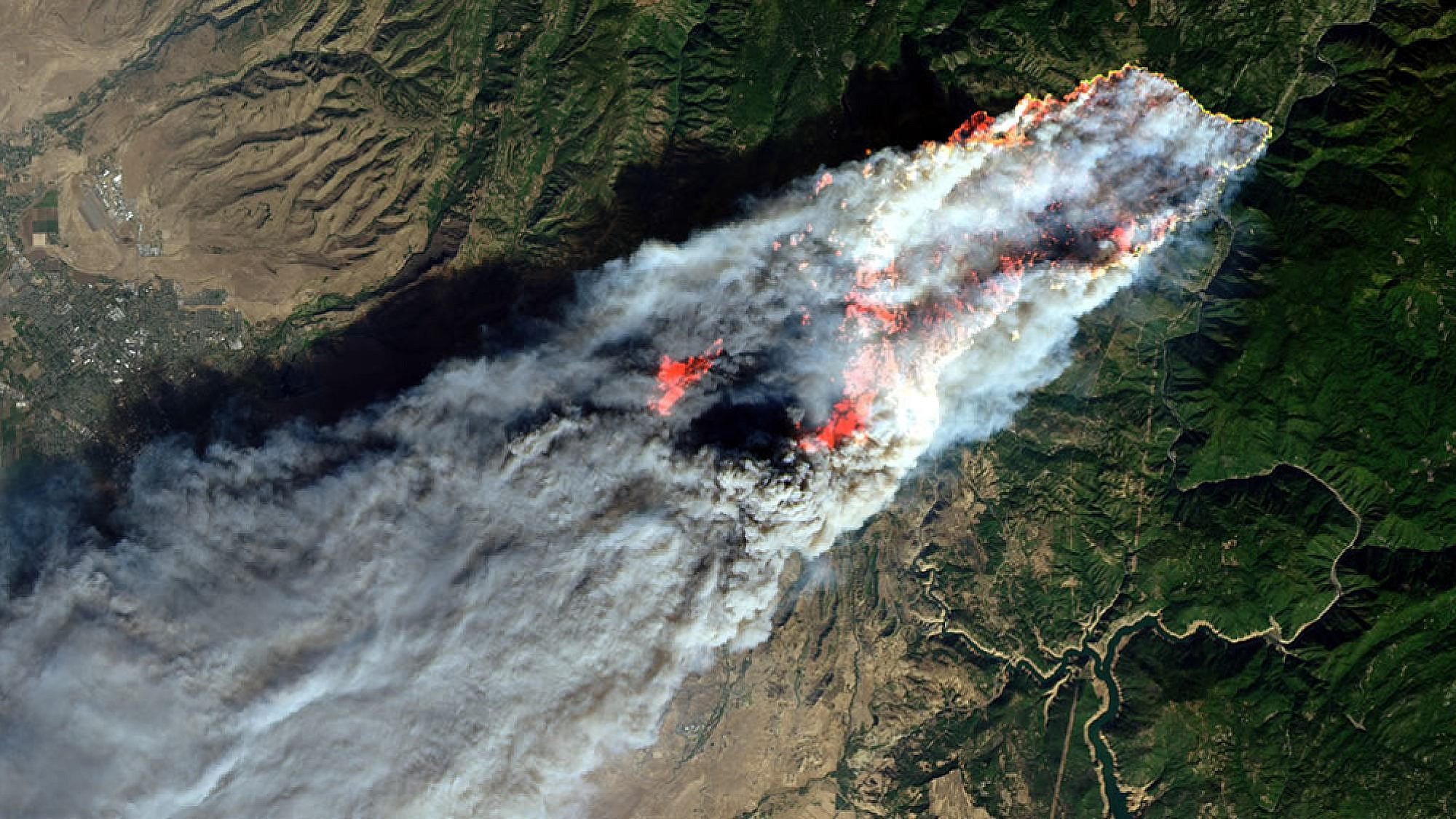 On the morning of Nov. 8, 2018, the Camp Fire erupted 90 miles (140 kilometers) north of Sacramento, Calif. By evening, the fast-moving fire had charred around 18,000 acres and remained zero percent contained. Credit: NASA (Joshua Stevens) via Wikimedia Commons.