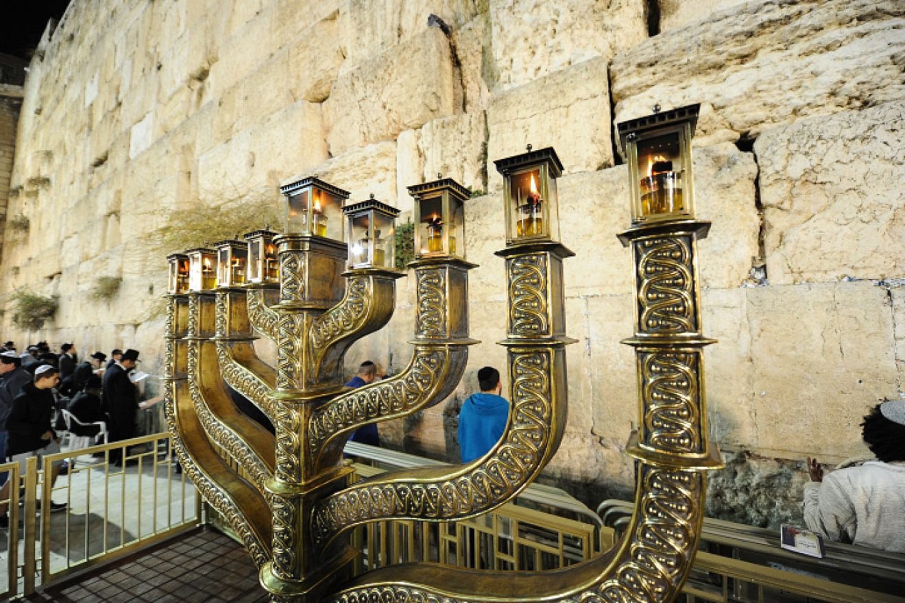 A Hanukkah menorah on the last night of the eight-day Jewish holiday, at the Western Wall in the Old City of Jerusalem, on Dec. 19, 2017. Photo by Mendy Hechtman/Flash90.