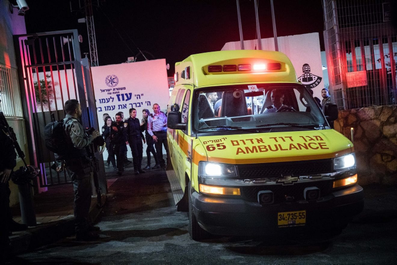 Israeli security and rescue personnel evacuate the assailant who was shot after stabbing and injuring several police officers in Jerusalem's Armon Hanatziv neighborhood on Nov. 14, 2018. Photo by Hadas Parush/Flash90.