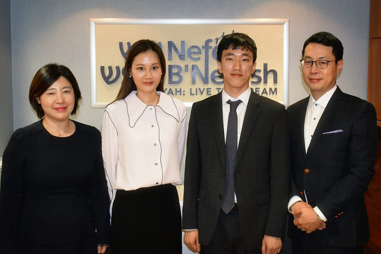 A four-person delegation from the South Korean Ministry of Unification visited Israel to learn about incorporating new immigrants into the country. From left are: Lee Sangmi of the policy-planning division; Kim Yoojin, director of the policy-planning division; Kang Heechan, deputy director of the policy coordination division; and Kuem Sungho, deputy director and lawyer of the policy-planning division. Credit: Photo courtesy of Nefesh B'Nefesh.