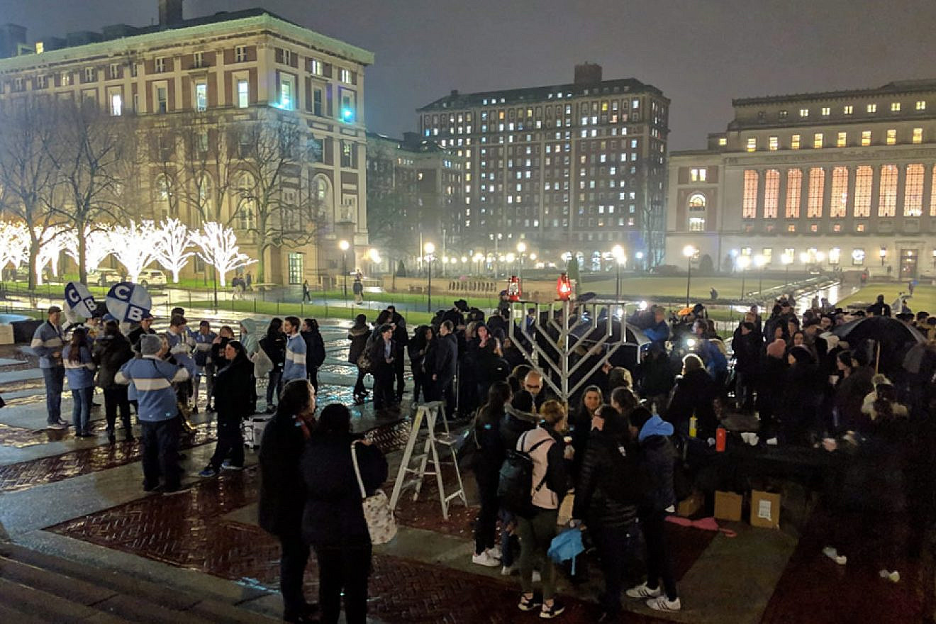 Members of the Columbia University community gather on Sunday at the public menorah-lighting, organized by Chabad at Columbia University outside Low Memorial Library, on the first night of Hanukkah, Dec. 2, 2018. Photo by Jonathan Harounoff.