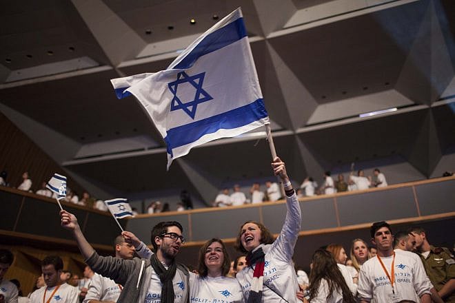 Young Jewish adults from all over the world participating in the Taglit Birthright program celebrate 10 years of its operation at an event held at the International Conference Center in Jerusalem. Taglit-Birthright offers a free 10-day educational trip to Jewish young adults, Jan. 7, 2013. Photo by Yonatan Sindel/Flash90.