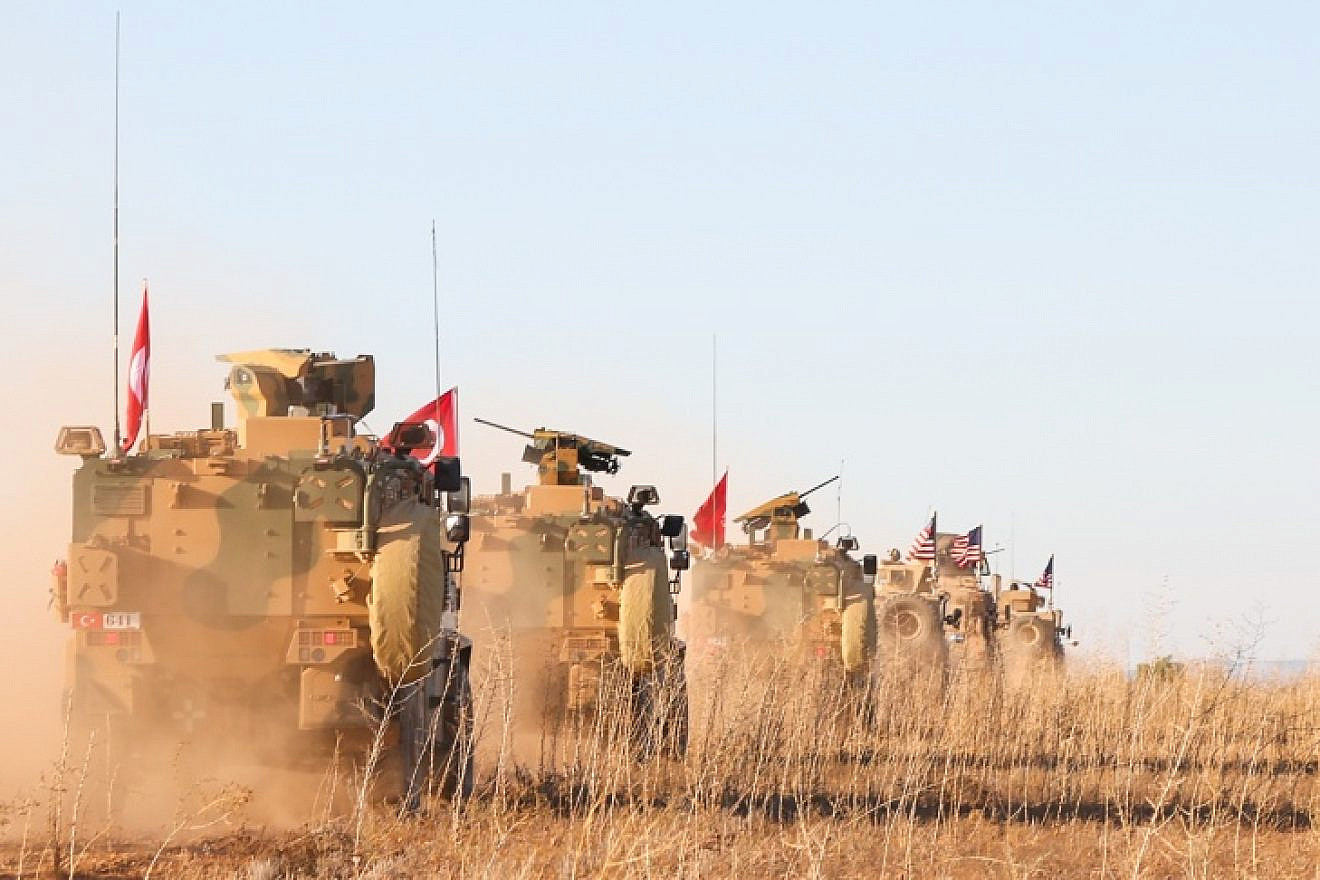 U.S. and Turkish soldiers conduct the first-ever combined joint patrol on Nov. 1, 2018, outside of Manbij, Syria. Credit: Combined Joint Task Force, Operation Inherent Resolve/Spc. Arnada Jones.