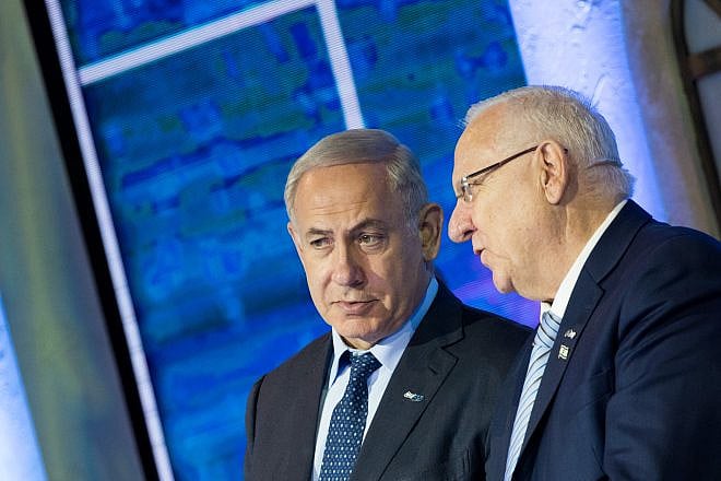 Israeli Prime Minister Benjamin Netanyahu with President Reuven Rivlin during the Israel prize ceremony at the International Conference Center (ICC) in Jerusalem on May 2, 2017. Credit: Yonatan Sindel/Flash90.