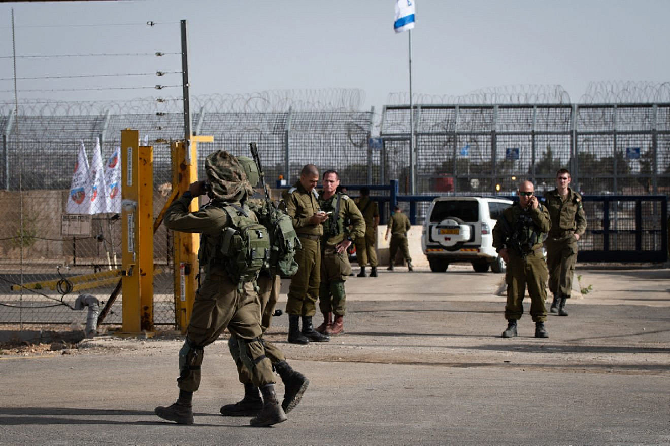 Israeli soldiers guard at the Israeli side of the Quneitra Crossing, in the Israeli Syrian border, in the Golan Heights on Oct. 15, 2018, as it reopens after four years. Photo by Basel Awidat/Flash90.