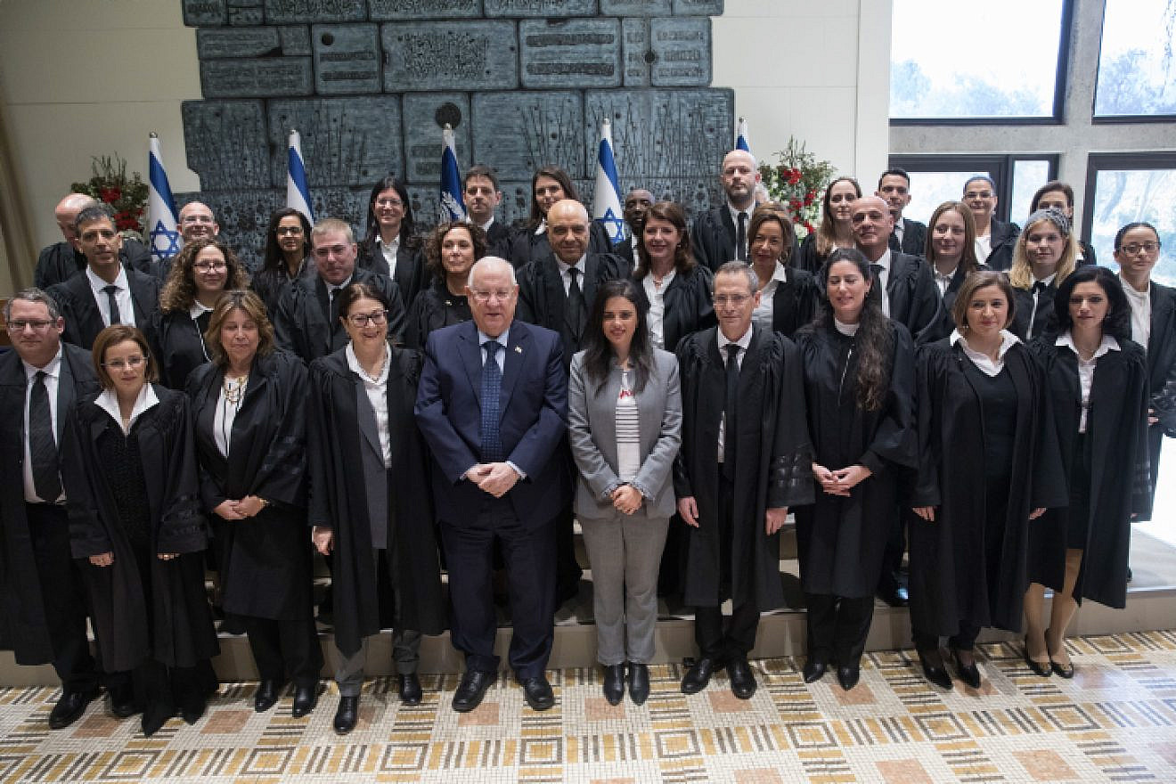 Israeli Justice Minister Ayelet Shaked , President Reuven Rivlin , Supreme Court President Esther Hayut poses for a picture with newly sweard in judges at the President's Residence in Jerusalem, on Jan. 8, 2019. Photo by Noam Revkin Fenton/Flash90.