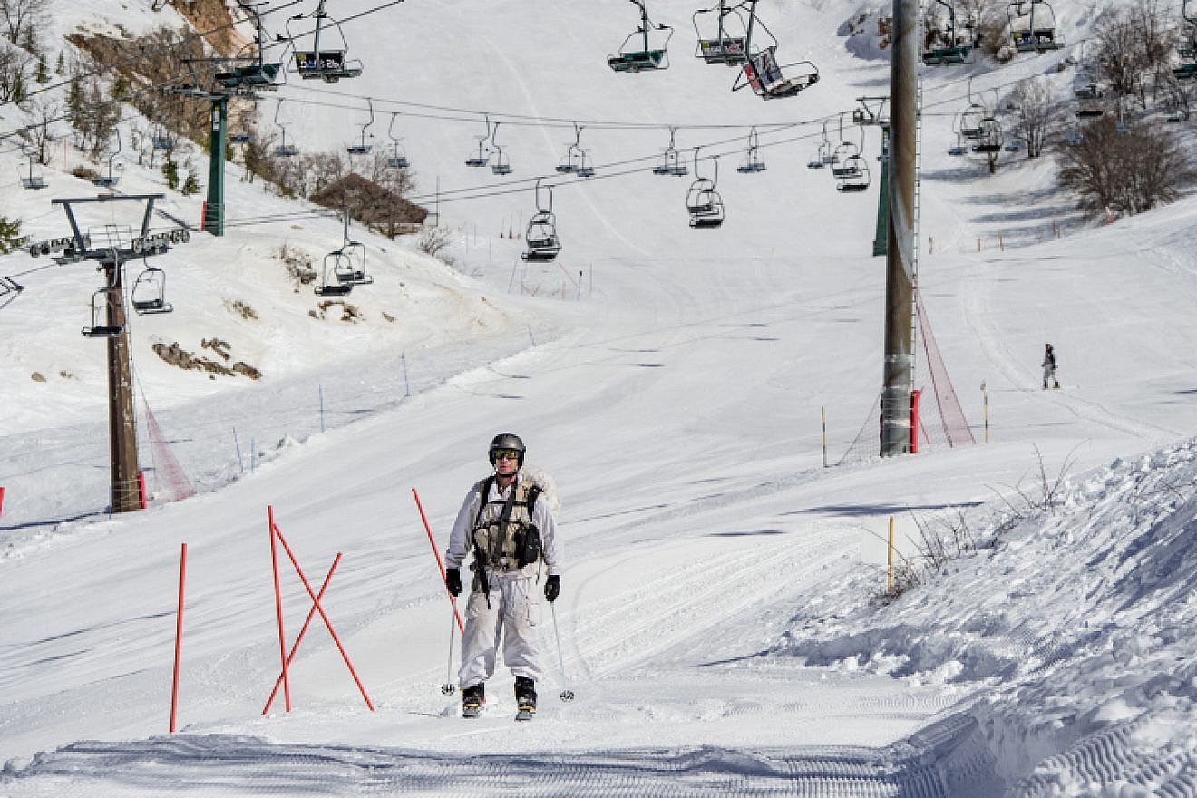An Israeli soldier skis on snow-covered Mount Hermon in the Golan Heights in northern Israel on Jan. 21, 2019. Photo by Basel Awidat/Flash90.