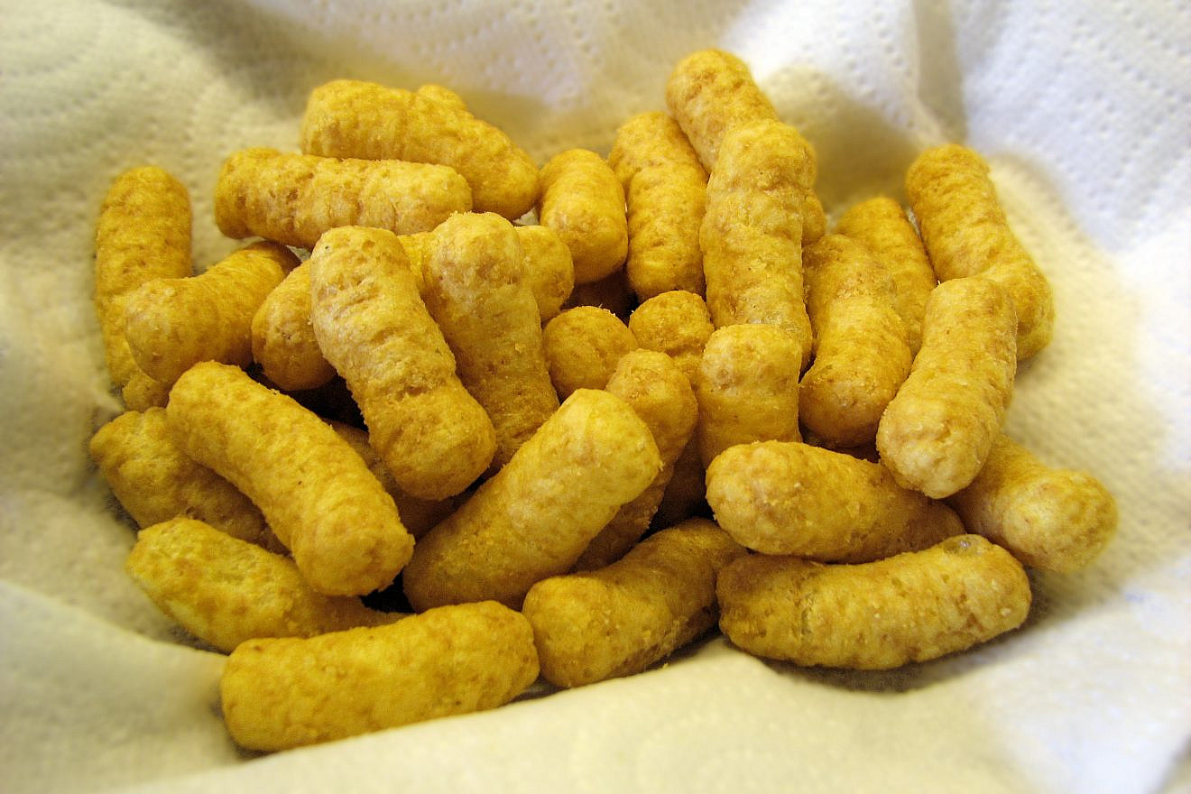 Bamba, the popular Israeli snack composed of puffed cornmeal and flavored like peanut butter. They also come in strawberry. Credit: Nsaum75/Wikimedia Commons.