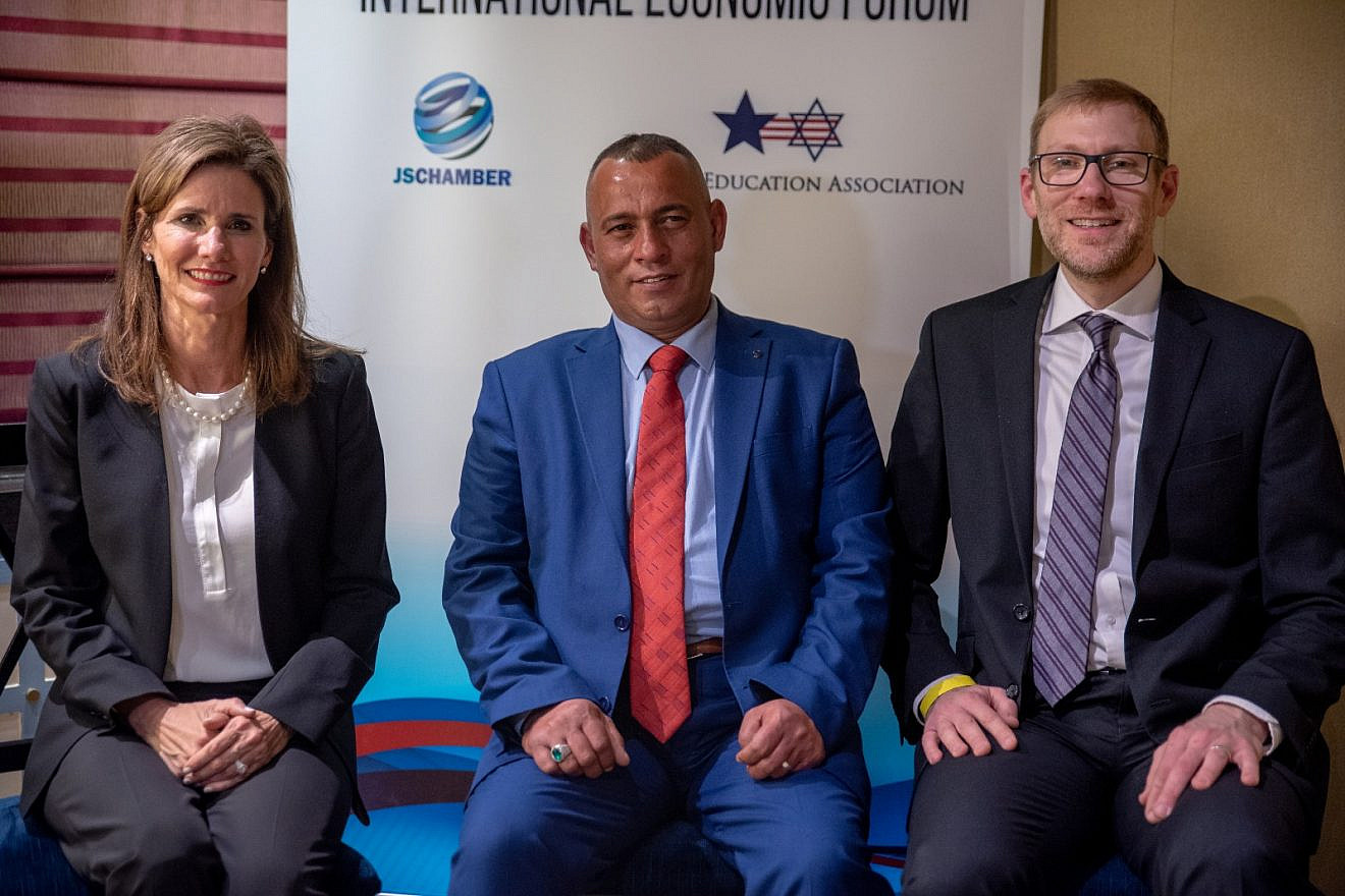 From left: Heather Johnston, founder and executive director of USIEA; Ashraf Jabari, a Palestinian business and community leader from Hebron; and Avi Zimmerman, co-founder of the JSC. Credit: Eitan Tal.