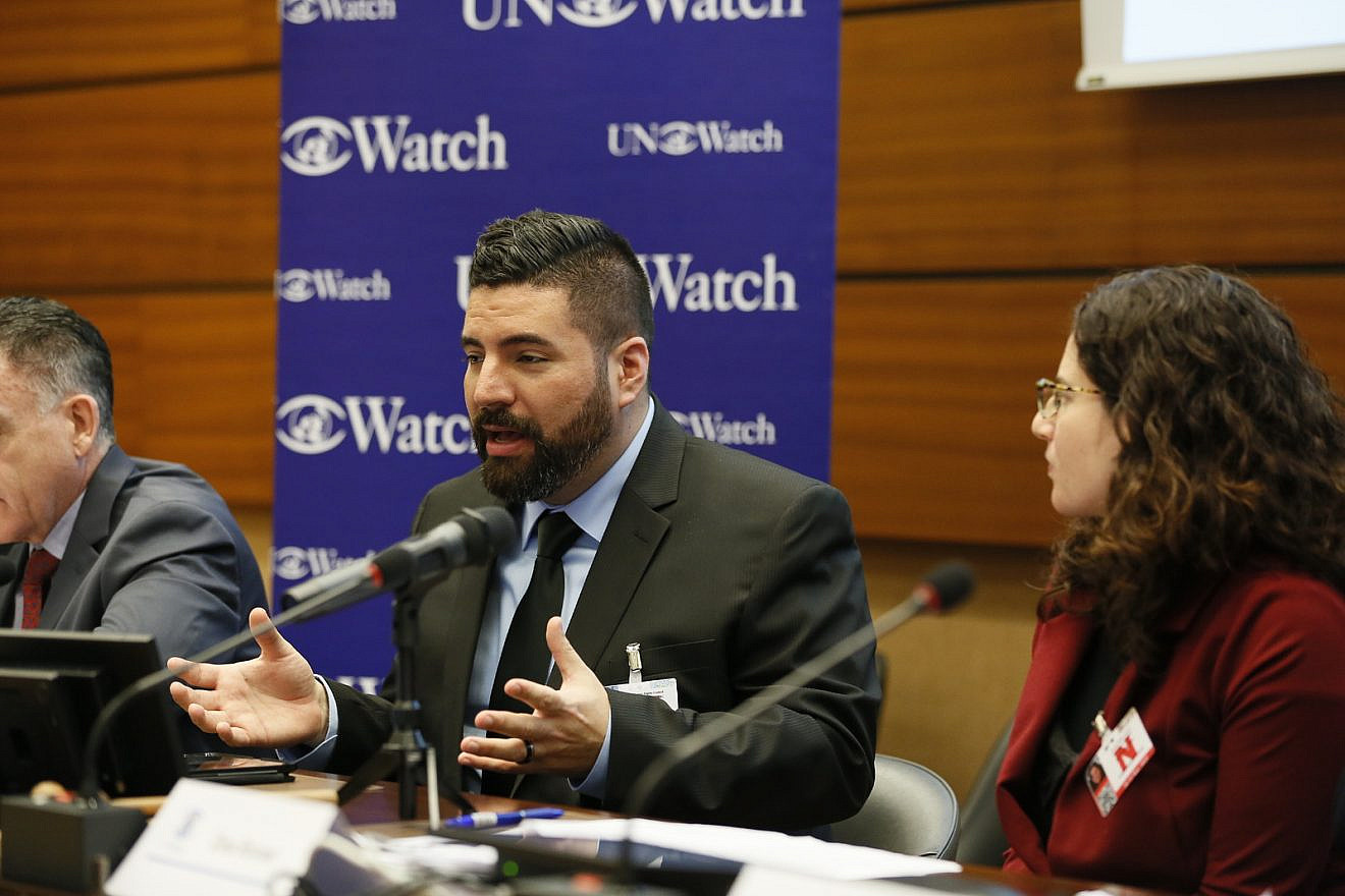 Joe Truzman addresses a session by the watchdog group U.N. Watch in Geneva on the UNHRC's report on Gaza. Credit: U.N. Watch.