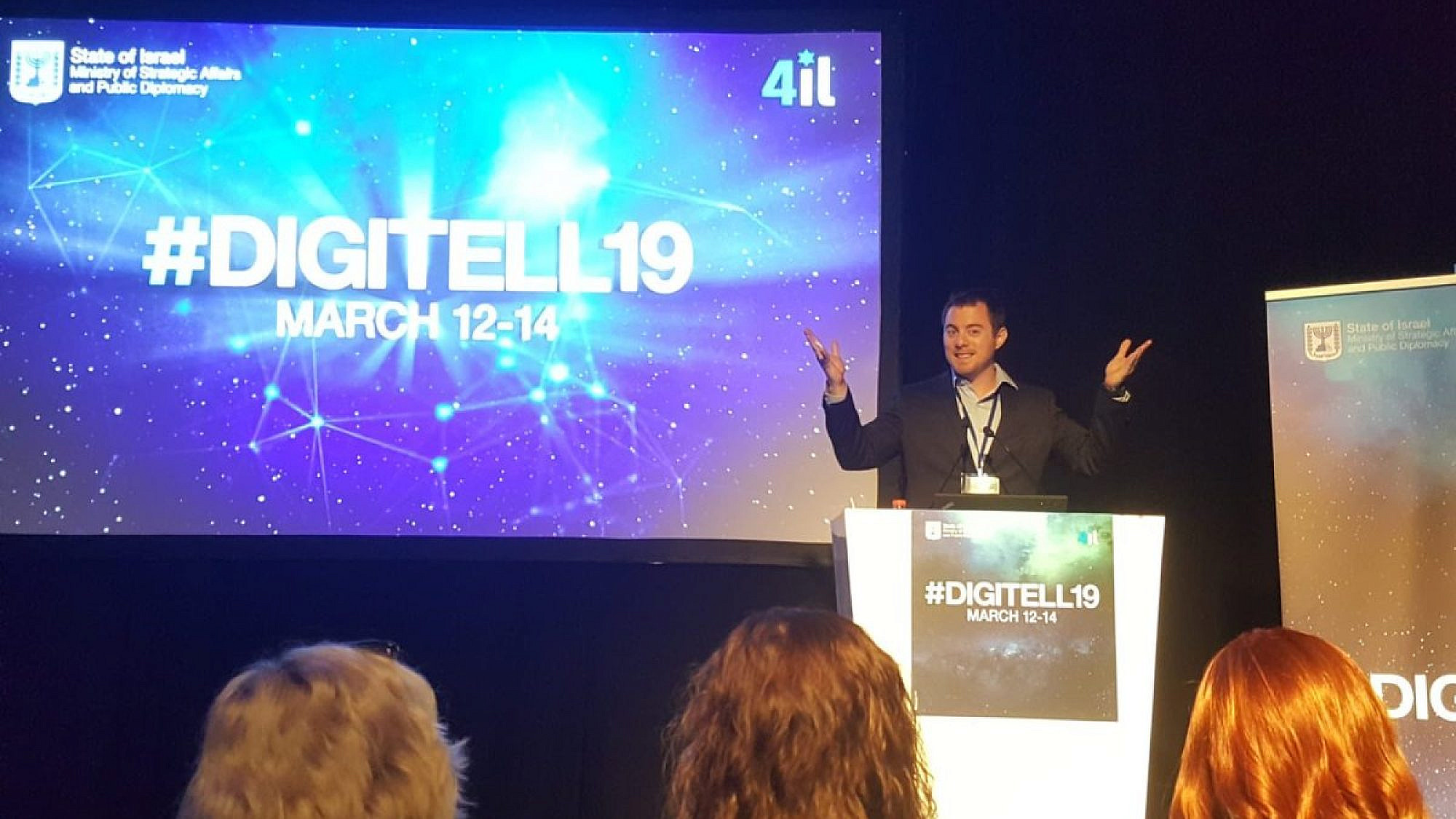 Ben Moore, foreign-media spokesperson for Israel's strategic-affairs ministry, addresses the DigiTell19 Conference in Jerusalem, March 2019. Credit: Twitter.