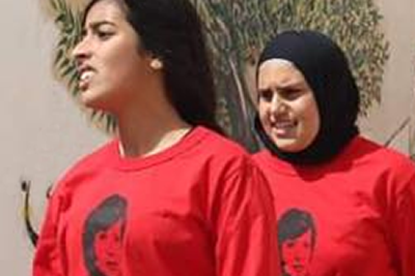 Girls wear shirts with the image of Palestinian terrorist Dalal Mughrabi at a sports event named after her. Credit: PMW.