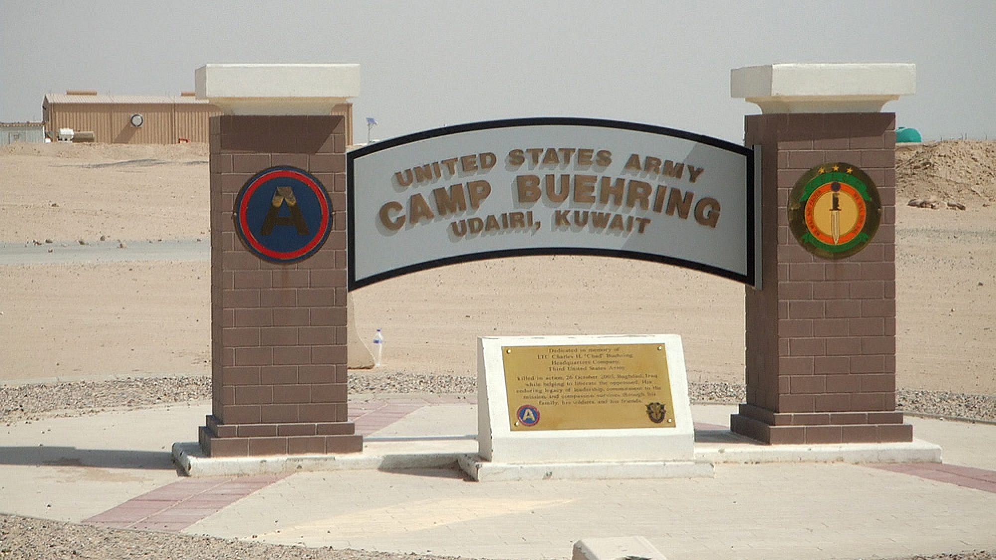 Entry sign at U.S. Camp Buehring, Kuwait. Credit: Wikimedia Commons.