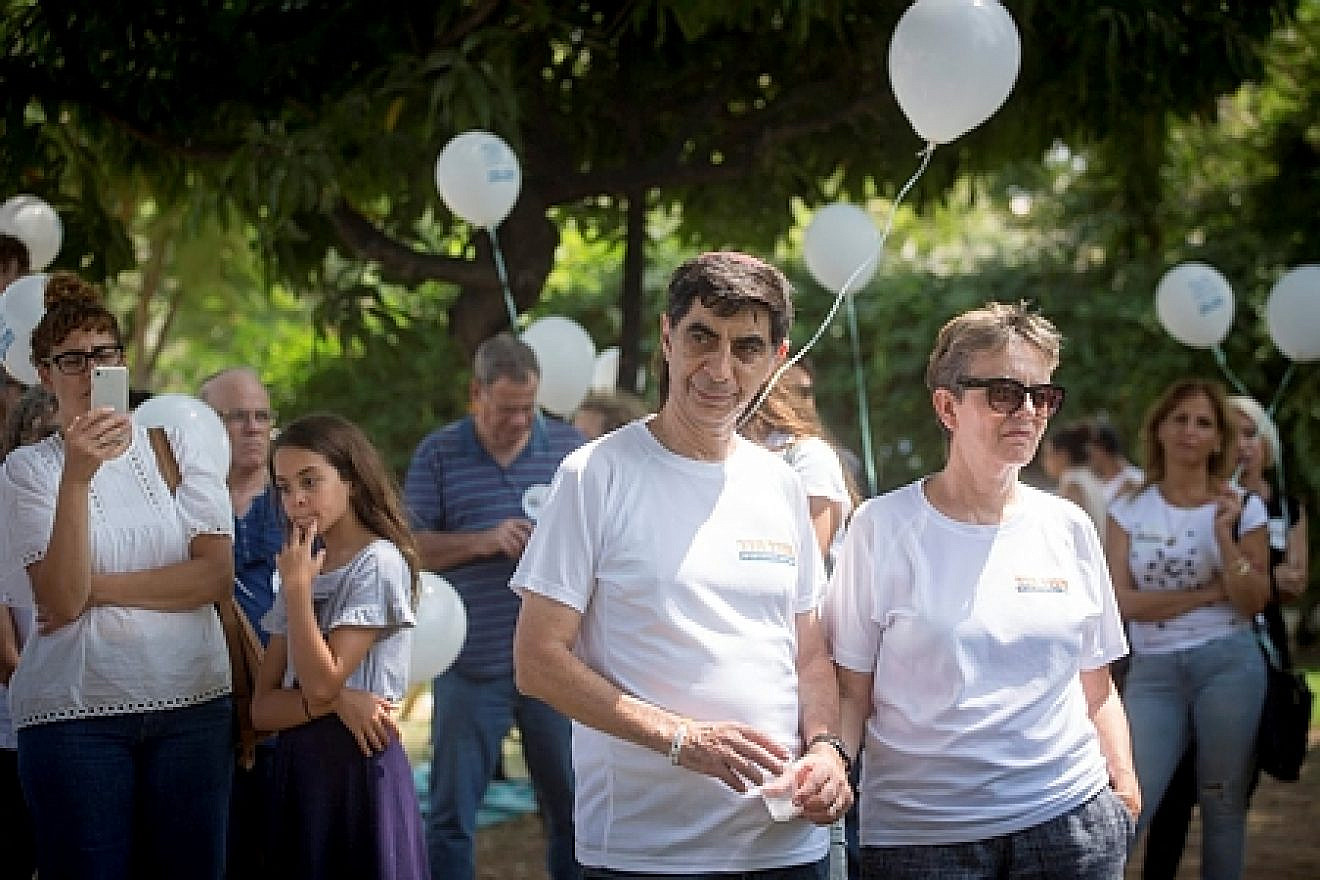 Leah and Simcha Goldin, the parents of late IDF Lt. Hadar Goldin, whose body is being held by Hamas in Gaza, attend a rally outside of Israel's Ministry of Defense in Tel Aviv on Aug. 31, 2018, calling on the government to do more to return the bodies of Goldin and IDF soldier Oron Shaul. Credit: Miriam Alster/Flash90.