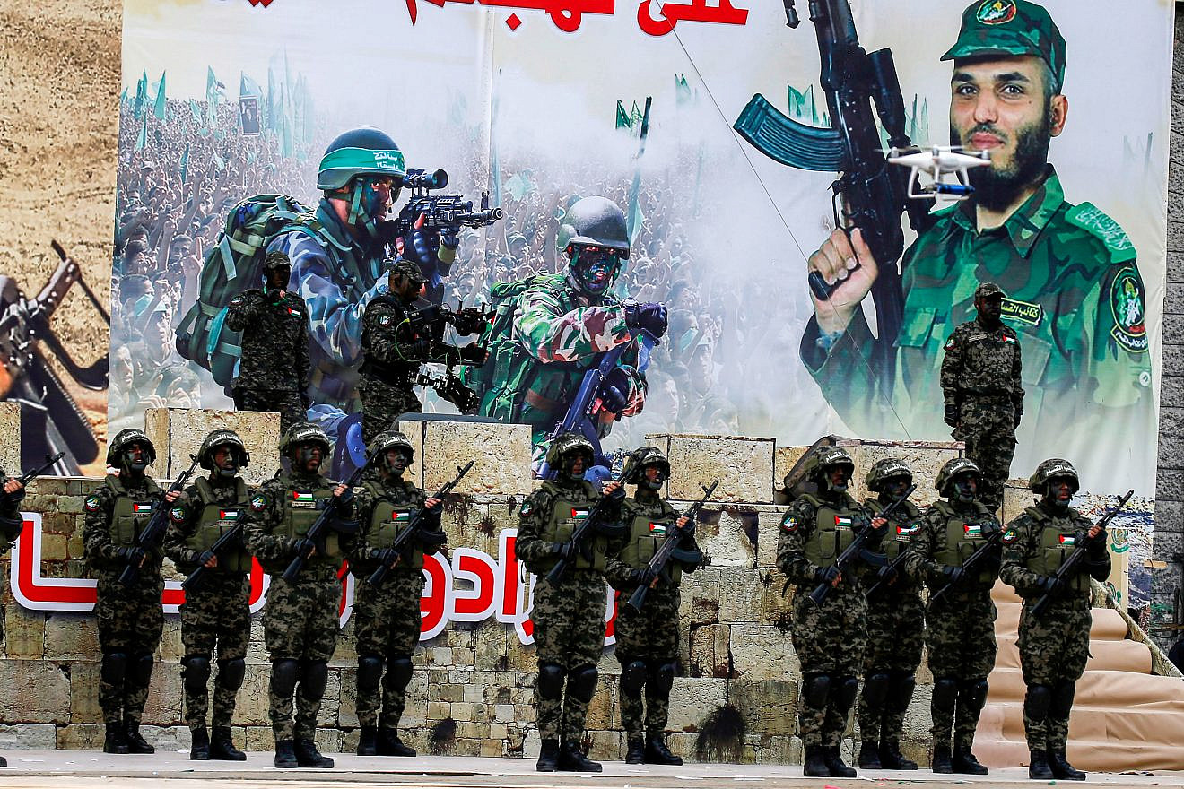 Palestinian members of the Al-Qassam Brigades, the armed wing of Hamas, at a rally in Gaza City celebrating the 31st anniversary of Hamas on Dec. 16, 2018. Credit: Abed Rahim Khatib/Flash90.