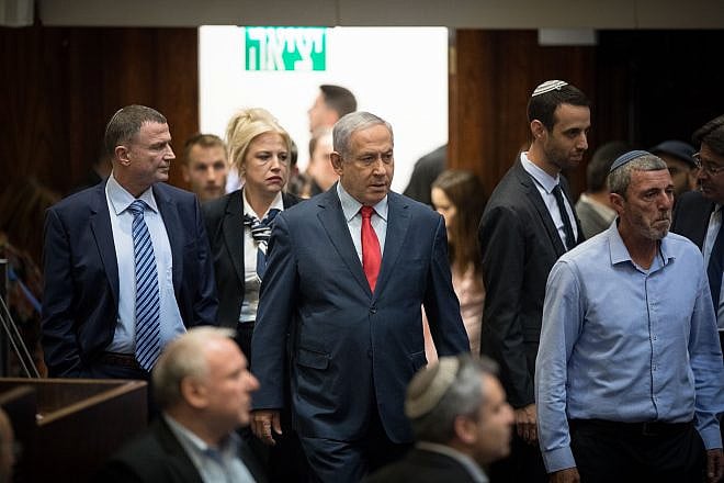 Israeli Prime Minister Benjamin Netanyahu with Israeli parliament members during a vote on a bill to dissolve the Knesset in Jerusalem on May 29, 2019. Credit: Yonatan Sindel/Flash90.