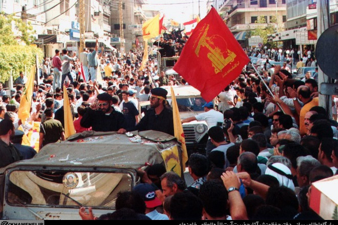 Hezbollah militants and supporters at a parade following the end of Israel's occupation of southern Lebanon in May 2000. Credit: Khamenei.ir via Wikimedia Commons.