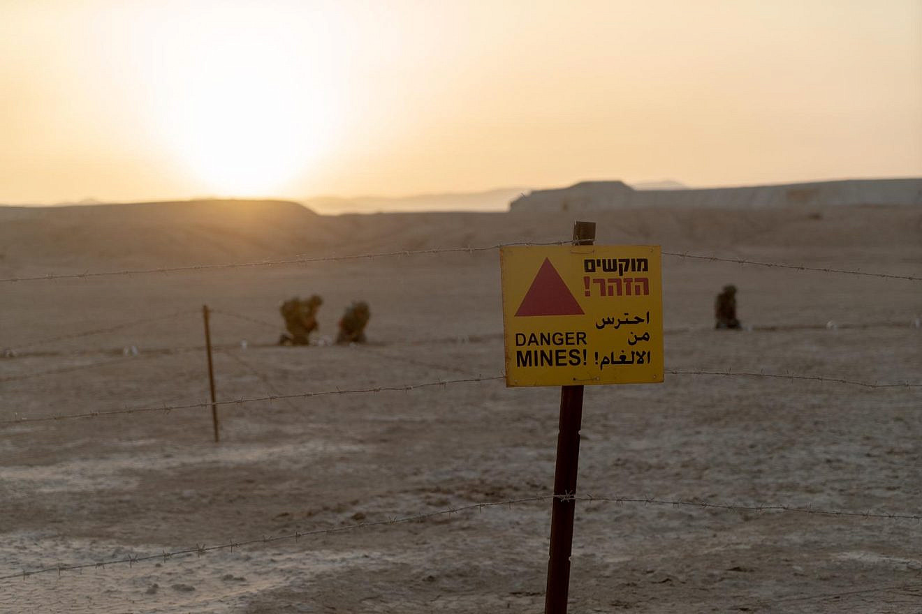 A view of a sign warning of mines in the area of the Jordan Valley. Credit: IDF Spokesperson Unit.