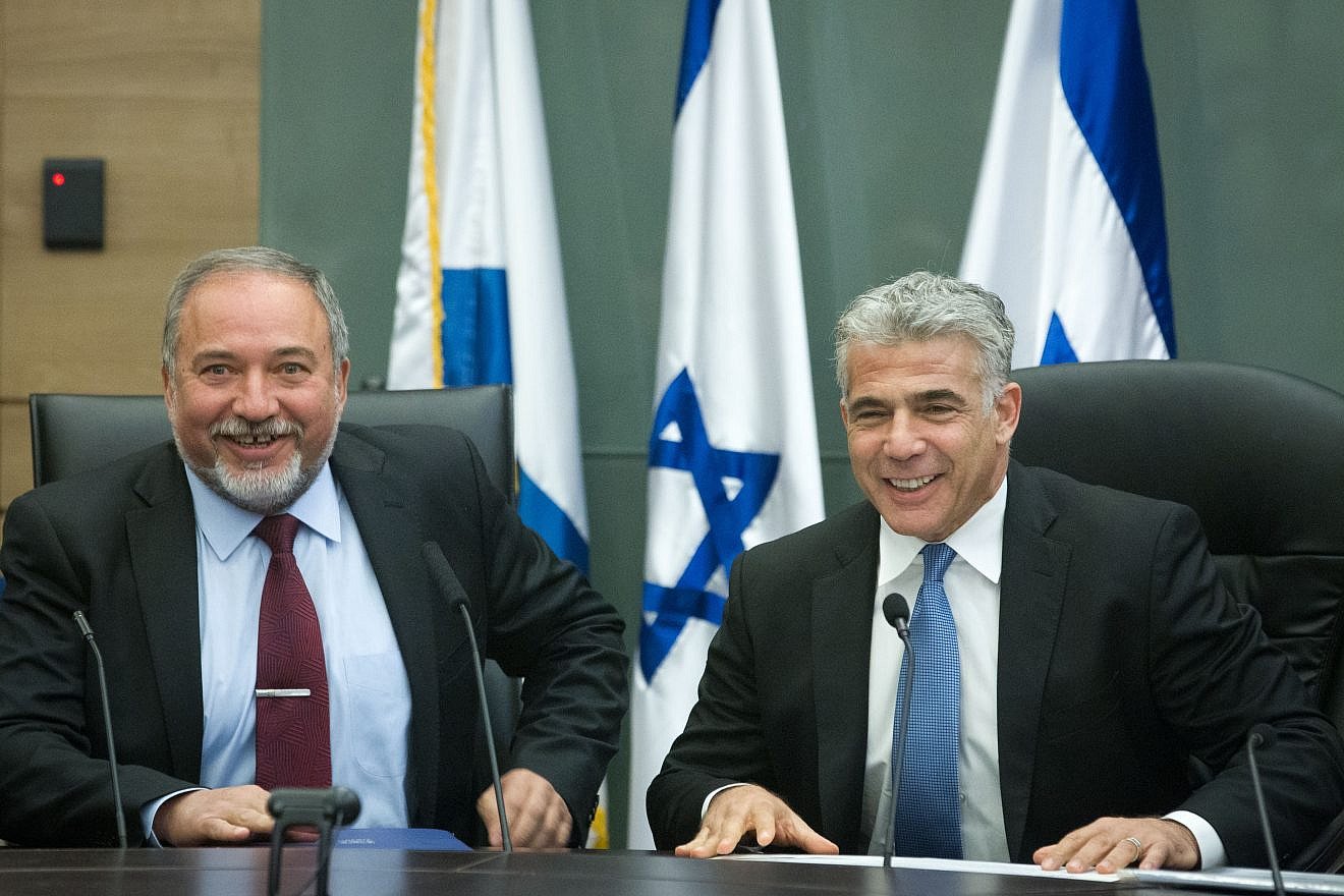 Yair Lapid and Avigdor Lieberman lead a joint conference in the Israeli parliament regarding Israel's foreign policy, Feb. 29, 2016. Photo by Miriam Alster/Flash90