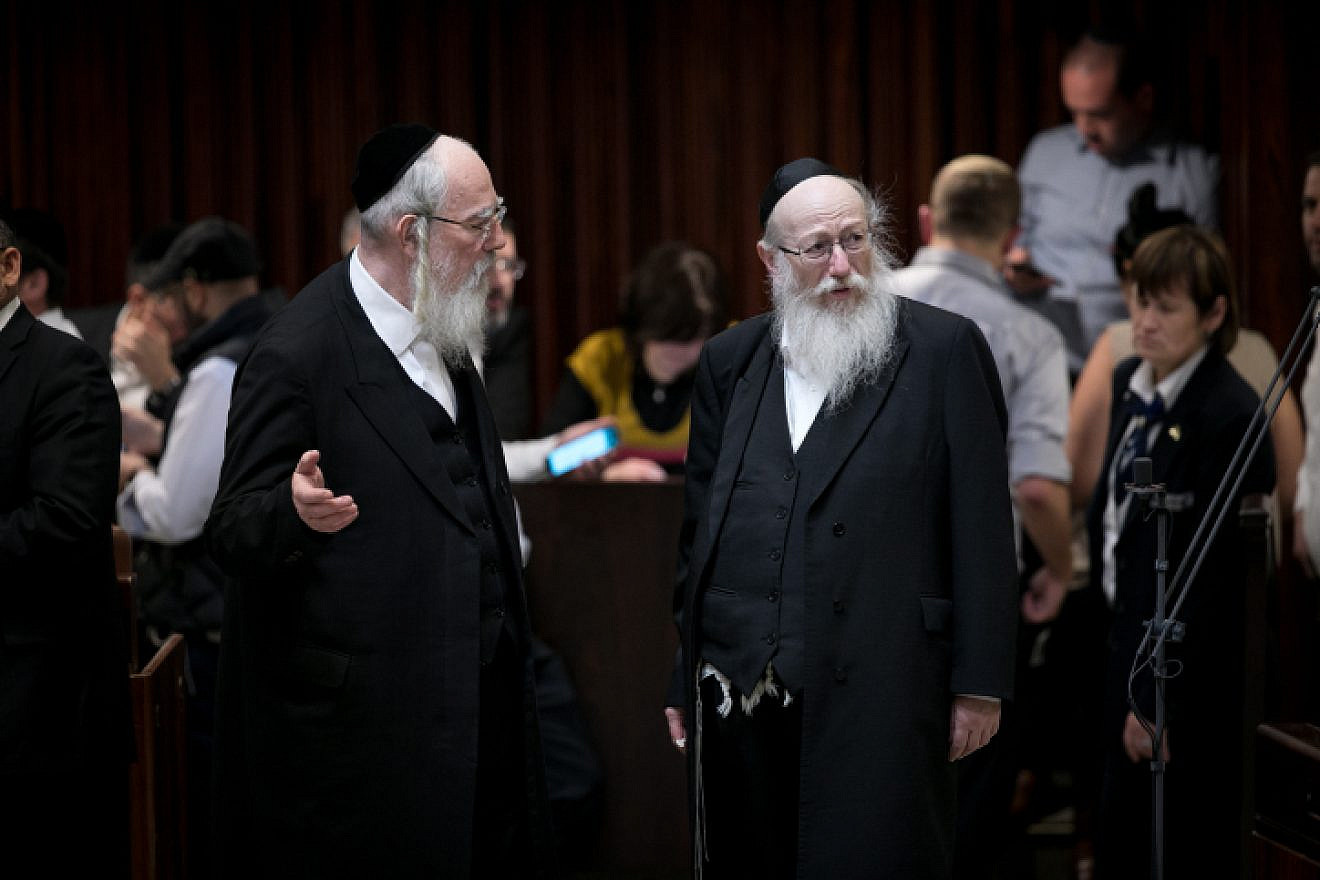 United Torah Judaism Knesset member Yaakov Litzman (right) during a plenum session in the Israeli parliament on March 12, 2018. Photo by Miriam Alster/FLASH90.