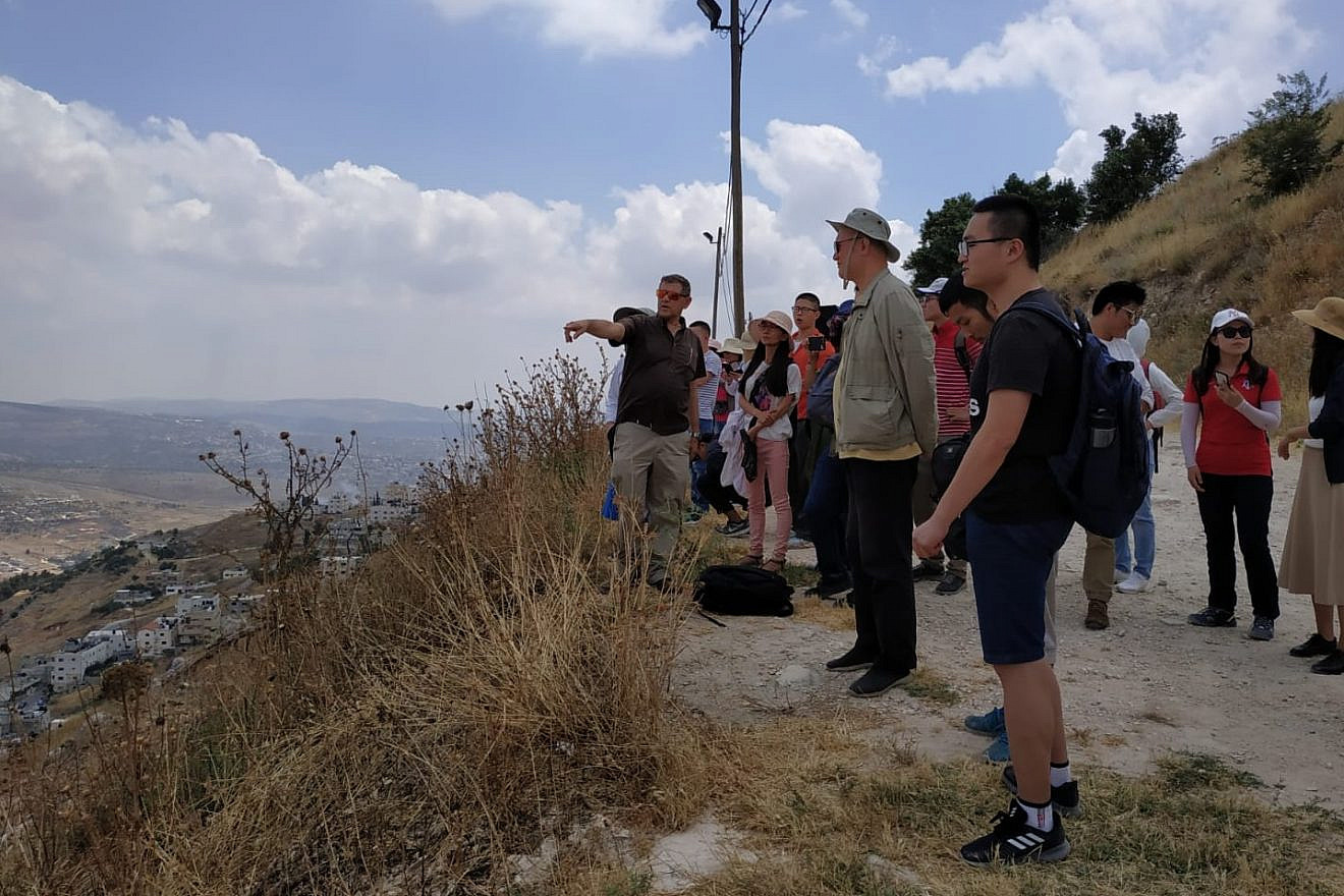 Chinese students take a tour of Mount Kabir in Samaria, as part of a program run by Im Tirtzu, June 13, 2019. Credit: Dov Trachtman.