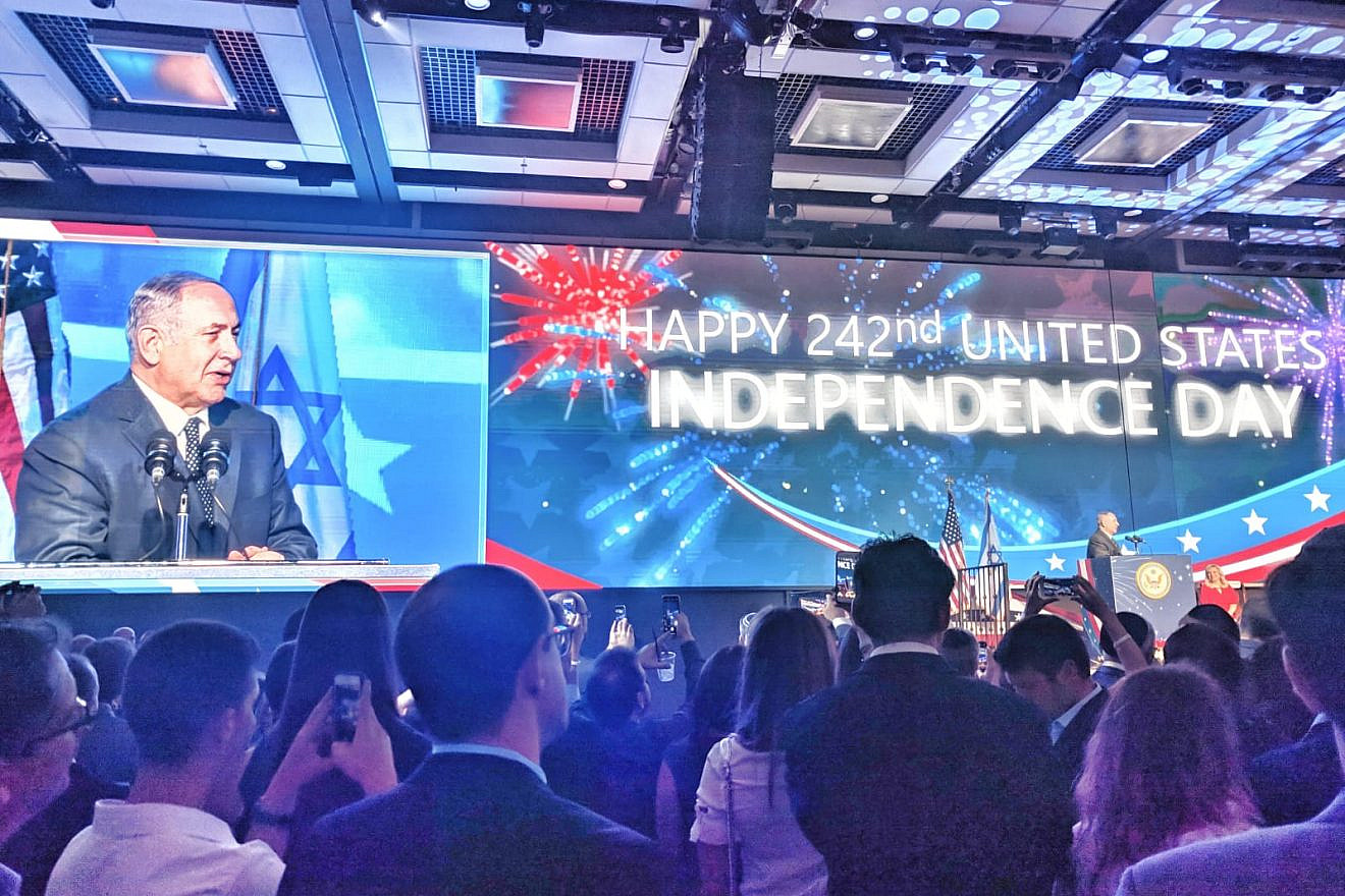 Israeli Prime Minister Benjamin Netanyahu addresses guests at the official 242nd U.S. Independence Day celebration at Airport City in Lod on July 3, 2018. Photo: Yishai Fleisher.