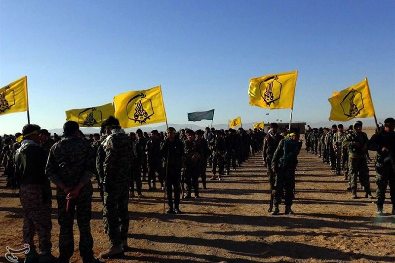 Fatemiyoun Brigade fighters in Syria during the Palmyra offensive (Dec. 2016). Credit: Tasnim News Agency via Wikimedia Commons.