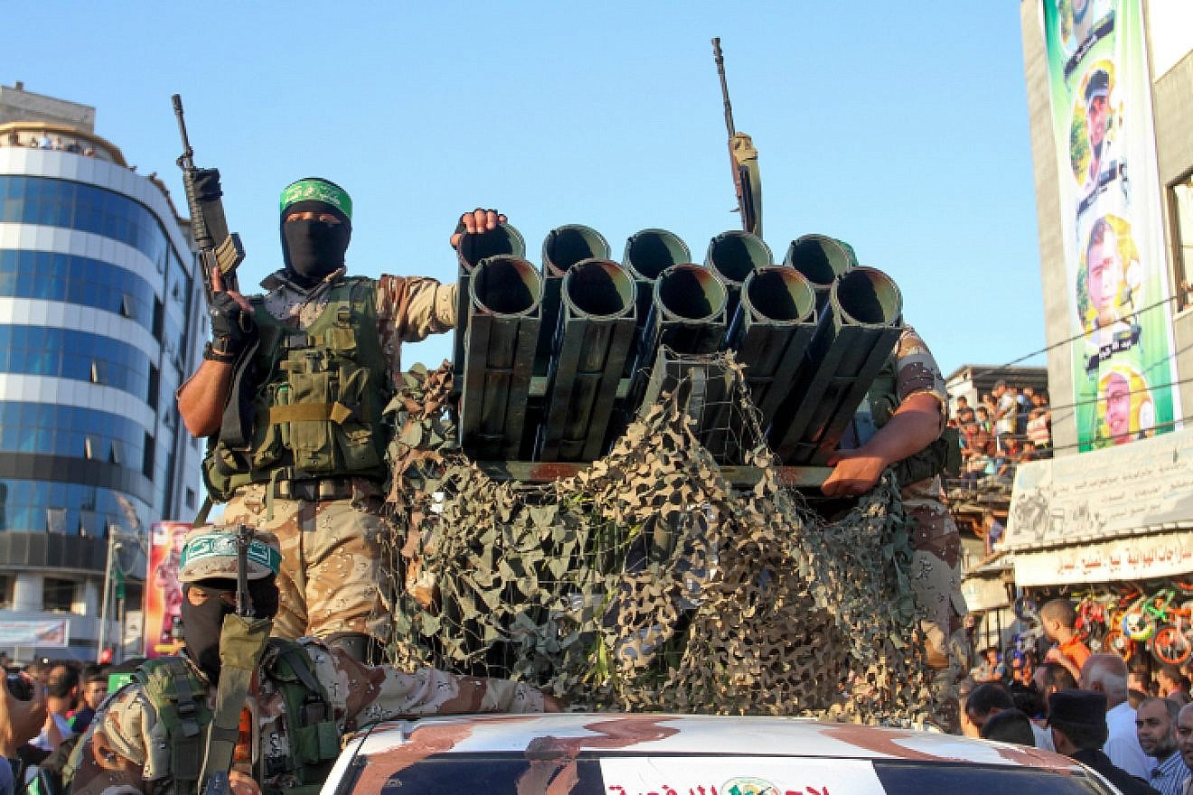 Al-Qassam Brigades members take part in a military parade on Aug. 21, 2016 in the Gaza Strip. Photo by Abed Rahim Khatib/Flash90.