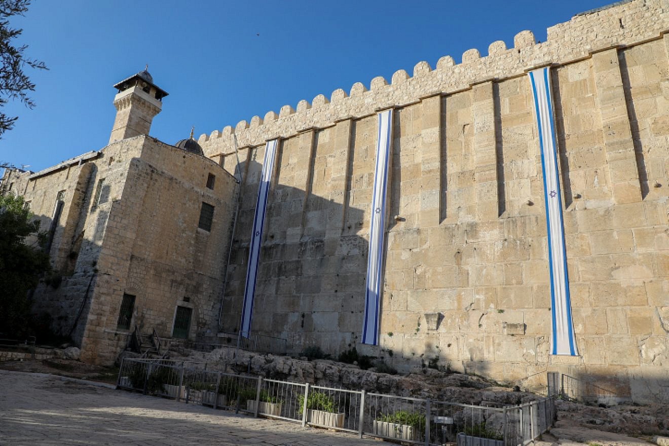 Israeli flags hangs on the walls of the Cave of the Patriarchs for Israel's 71st Independence Day, in the West Bank city of Hebron, May 8, 2019. Photo by Gershon Elinson/Flash90.
