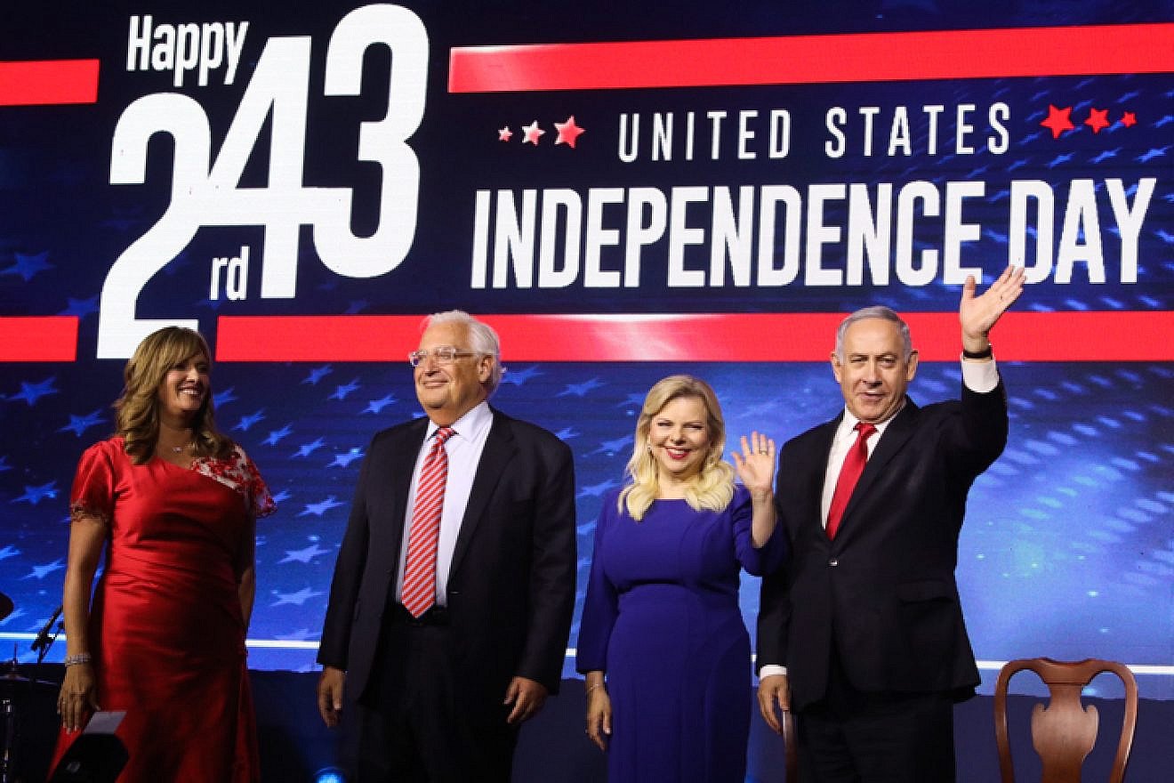 Israeli Prime Minister Benjamin Netanyahu and his wife, Sara, stand next to U.S. Ambassador to Israel David Friedman and his wife, Tammy, at a U.S. Independence Day celebration in Jerusalem on July 2, 2019. Photo by Marc Israel Sellem/POOL.