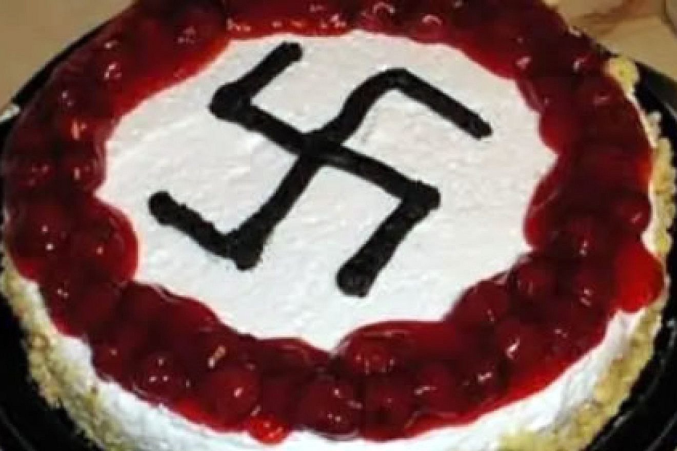 Djamel Boumaaz, an official in the French neighborhood of Montpelier, celebrated his 40th birthday with a swastika-decorated cake, July 2019. Credit: Twitter.