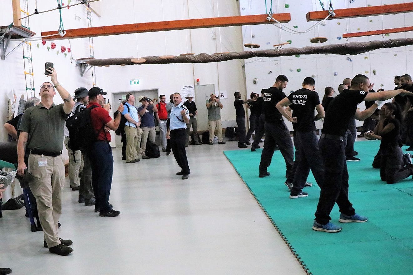 Delegates from the Georgia International Law Enforcement Exchange (GILEE) 27th annual peer-to-peer training program in partnership with Israel witness a police training session. Credit: GILLEE.