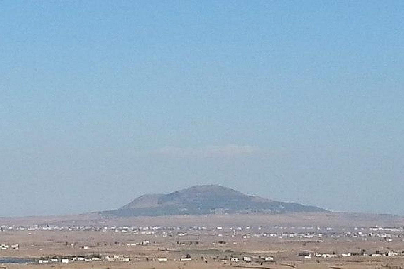 Tel al-Hara in the Hauran plain, seen from the Golan Heights, on Sept. 11, 2014. Credit: Mati Shaller via Wikimedia Commons.