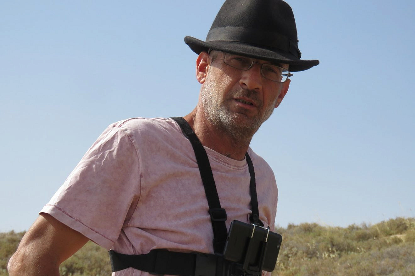 Far-left activist Guy Hirschfeld filming Israel Defense Forces and residents in the Jordan Valley. Credit: Im Tirtzu.
