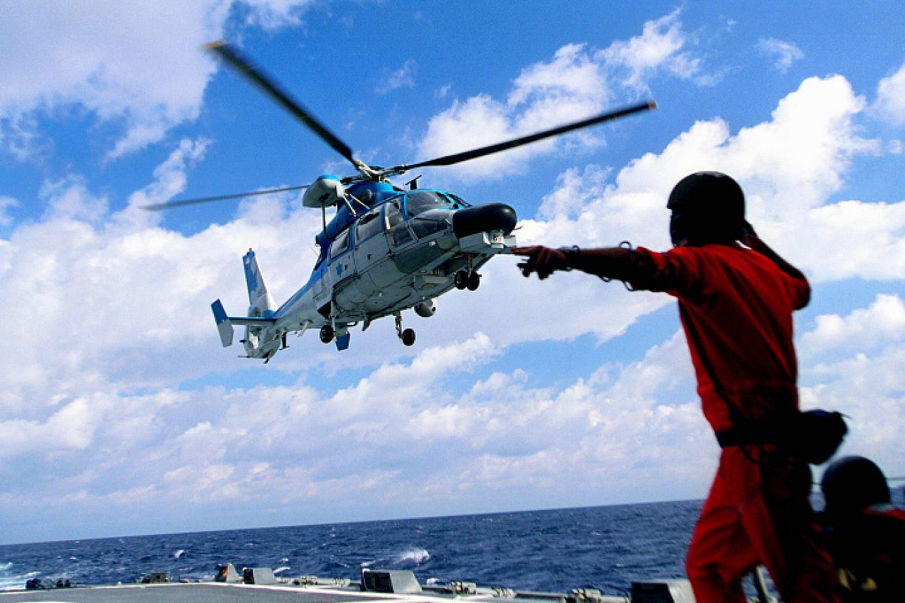Illustrative: A demonstration on the 60th Independence Day of Israel in front the beach of Tel Aviv: A naval chopper landing on The Saar 5 Missile Boat.  Photo by: Moshe Shai/Flash90.