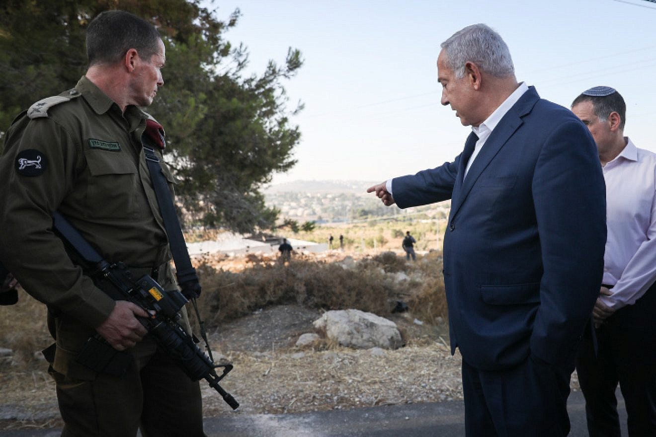 Israeli Prime Minister Benjamin Netanyahu visits the location where yeshivah student Dvir Sorek's body was found near Migdal Oz in Gush Etzion on Aug. 8, 2019. Photo by Noam Revkin Fenton/Flash90.